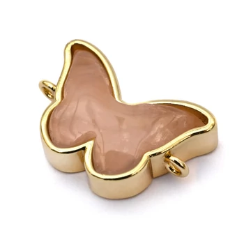 Pillangó összekötő elem, rózsakvarc, arany színű foglalat, 20x14 mm, 1 db