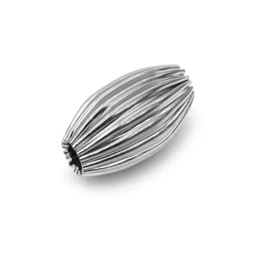Nemesacél ovális köztes dísz, recés, 10x5 mm, 1 db