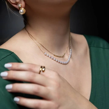 Nemesacél nyaklánc arany színű, 2 soros, gyöngyös lánchosszabbítóval, 39+5 cm