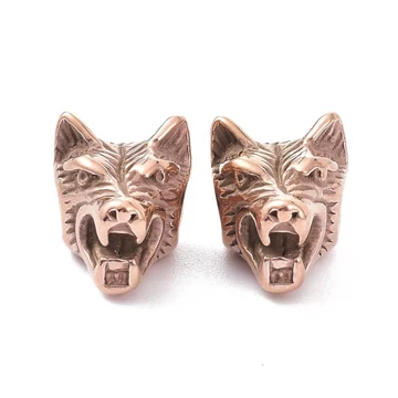 Nemesacél farkas fej köztes dísz, rosegold szín, 14x11 mm, 1 db