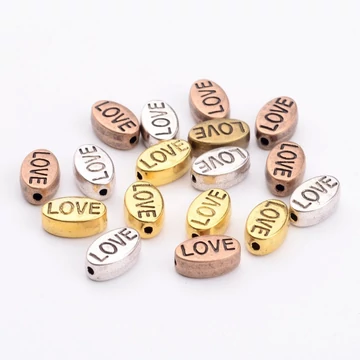 Ovál love (vegyes szín) köztes dísz, 10x6 mm (10 db)