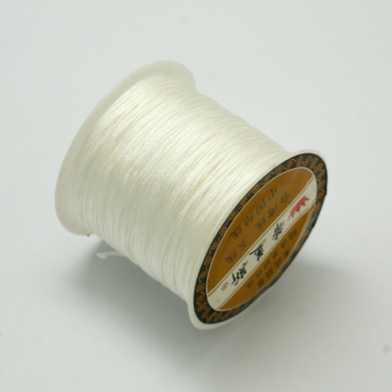 Műselyem szál (fehér) tekercsben, 0,8 mm, kb. 30 m