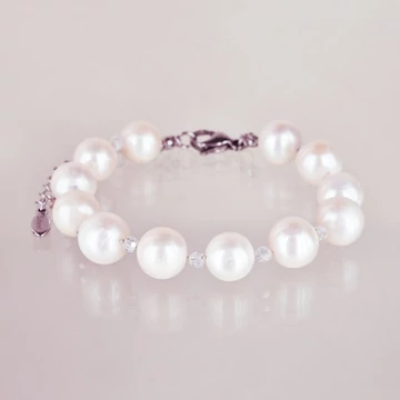 Tenyésztett gyöngy karkötő cirkónia gyöngyökkel, szemenként csomózva, nemesacél szerelékkel