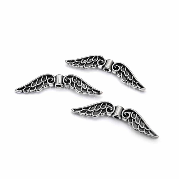 Angyalszárny (áttört mintás) köztes dísz, 31 mm (10 db)