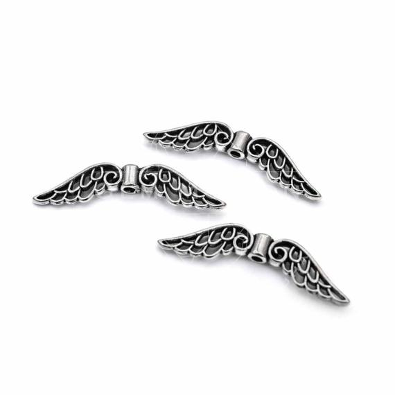 Angyalszárny (áttört mintás) köztes dísz, 31 mm (10 db)