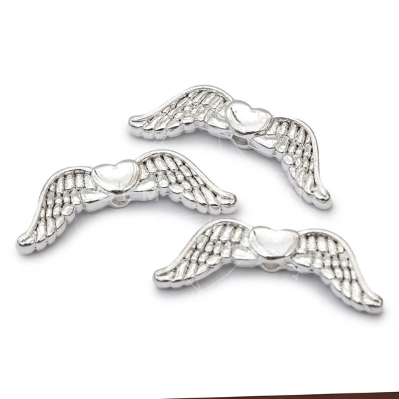 Angyalszárny köztes dísz, ezüst szín, 20x7 mm, 10 db