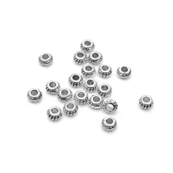 Bali gyöngy köztes dísz (2), 4 mm (50 db)