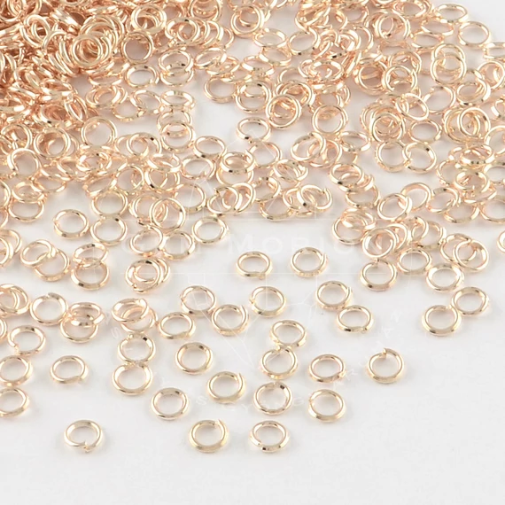 Karika, rosegold, 0,7x4 mm, kb. 100 db