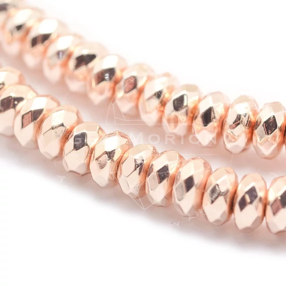 Hematit (rosegold) fazettált button köztes dísz, 8x3 mm (10 db)