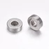 Kép 1/2 - Nemesacél kerek, lapos köztes dísz, 7 mm, 2,5 mm lyuk (10 db)
